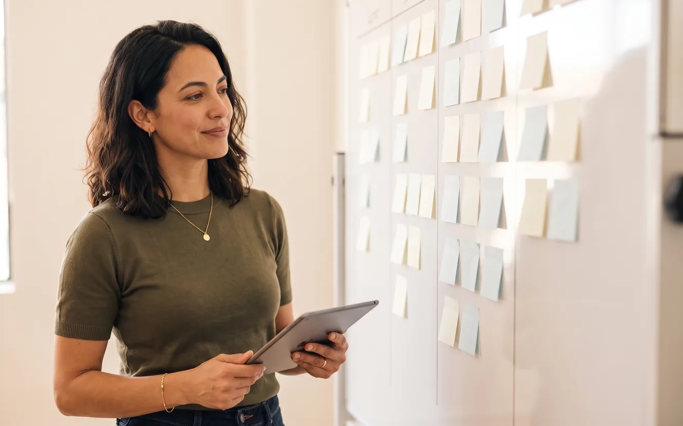 Delivery lead using actual project time while planning work at a team task board